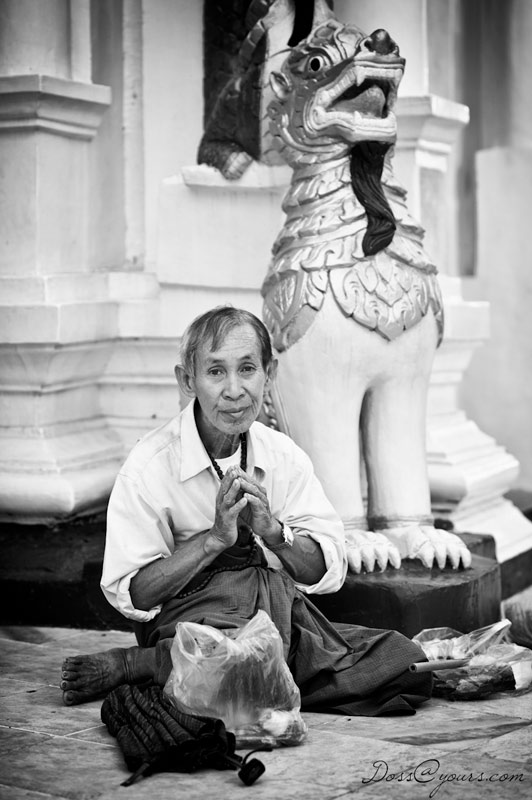 Devotee and Lion Guardian at Shwedagon Pagoda, Yangon Burma, by doss@yours